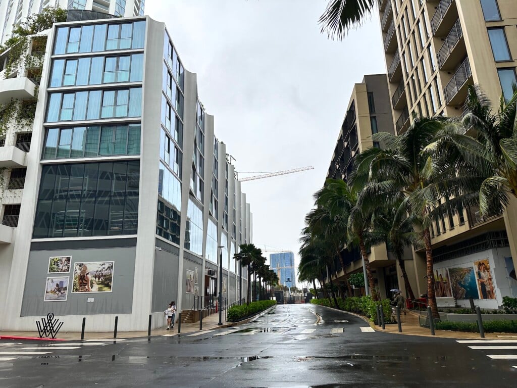 street view between buildings on a rainy day