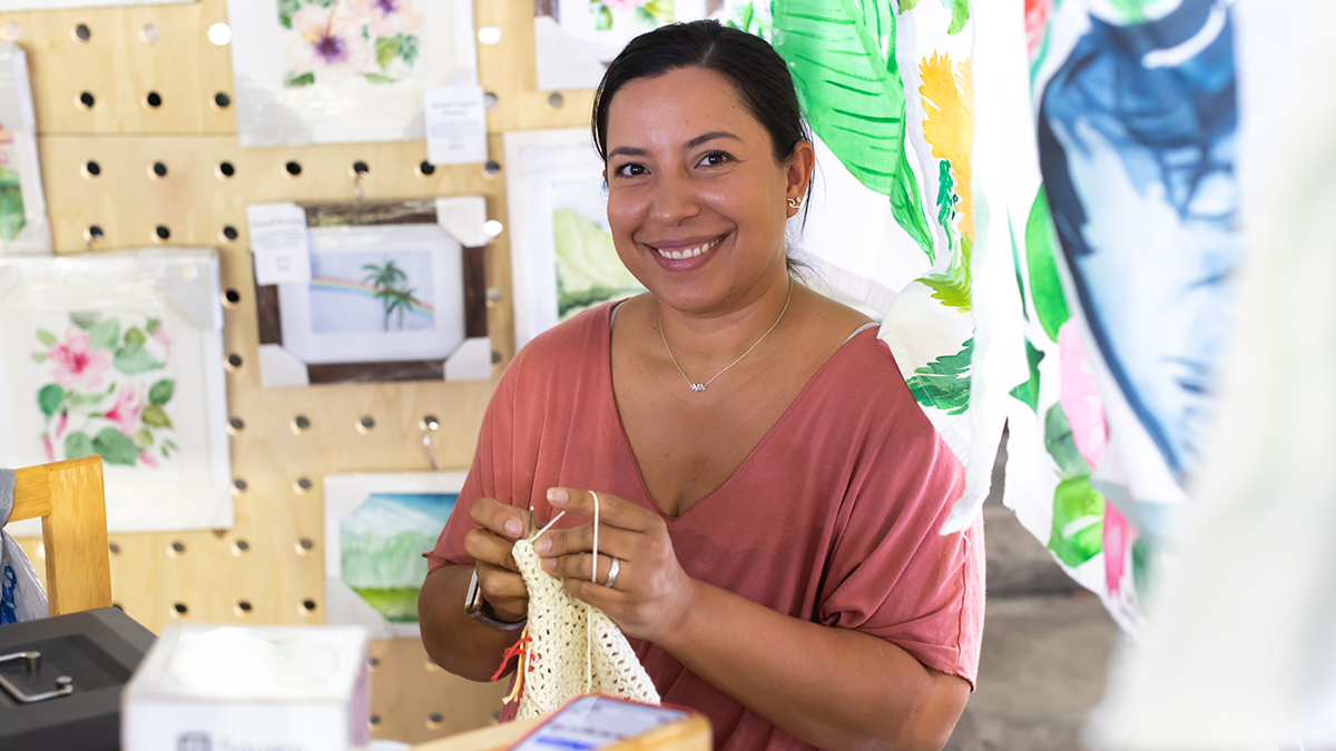 Woman smiling at Aloha Home Market